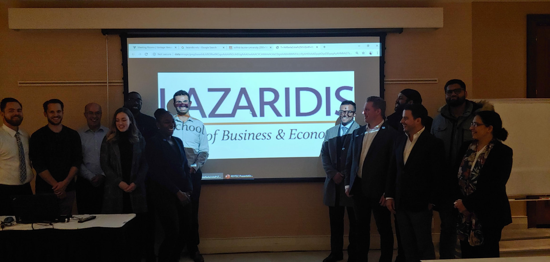 Peyman Moeini with participants at the Lazaridis School of Business and Economics