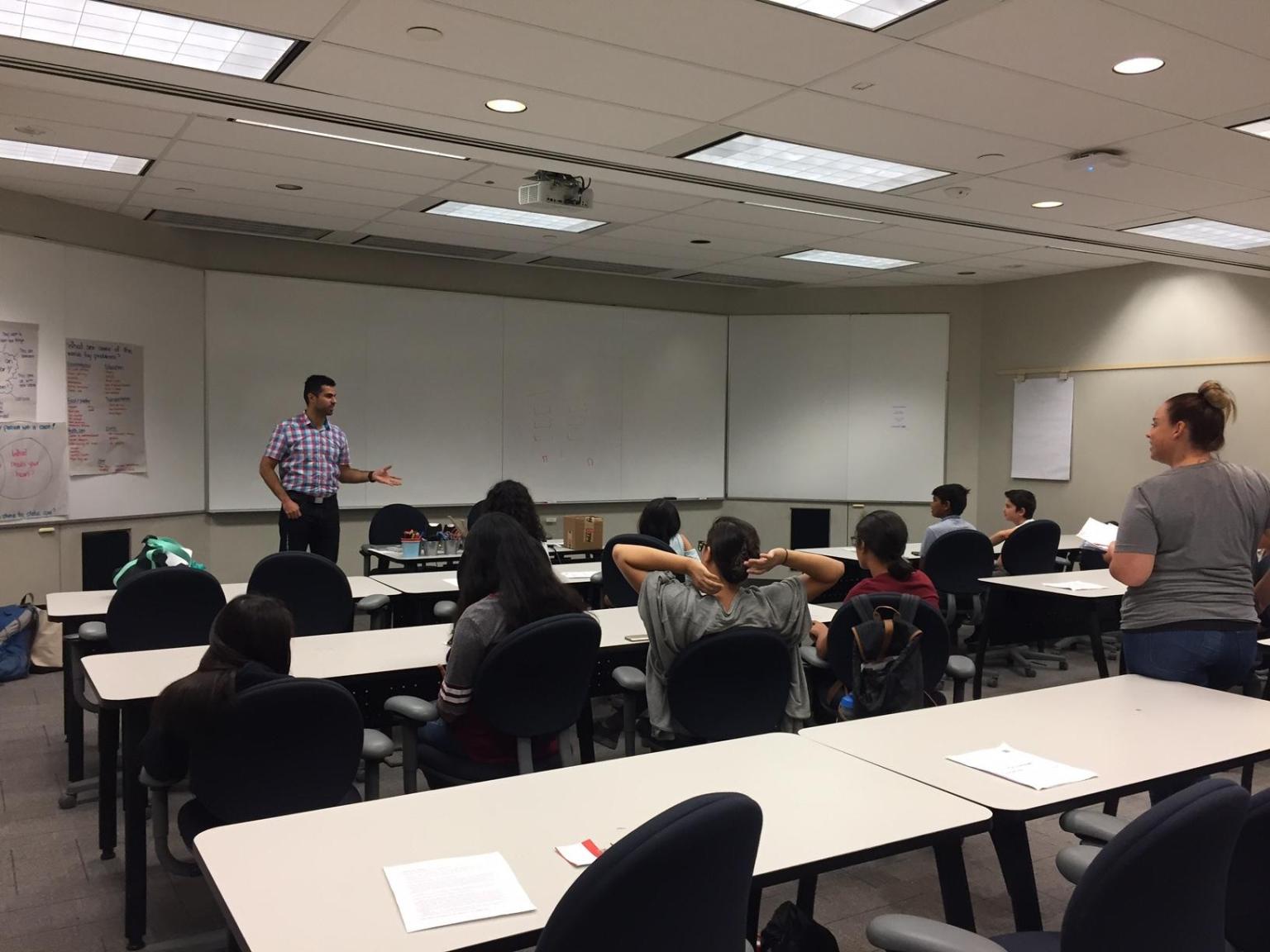Peyman Moeini leading a classroom workshop